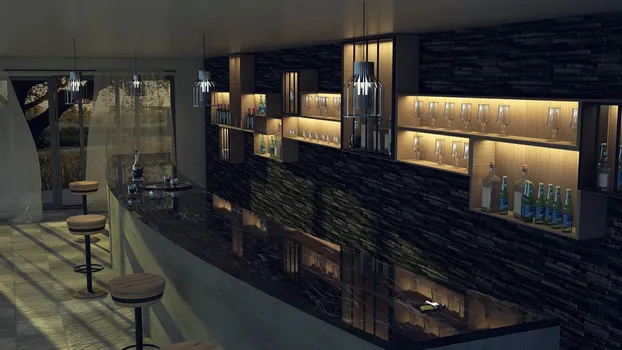 Cantina con barra en acabado de concreto aparente y cubierta de cuarzo, elementos tipo alacena en pino con detalles en PTR, muros con piedra natural